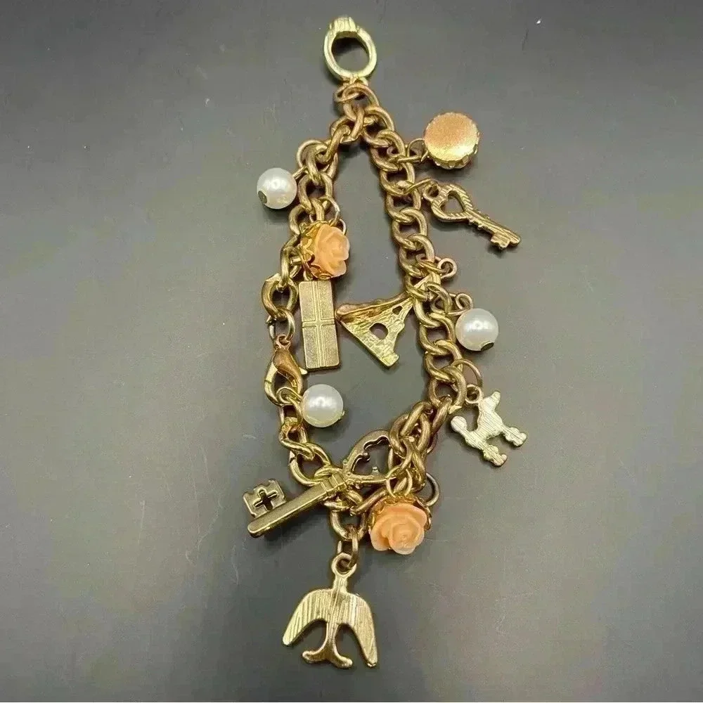 VGT Eiffel Tower & Floral Design Gold-tone Charm Stretch Bracelet for Girls - Picture 6 of 8